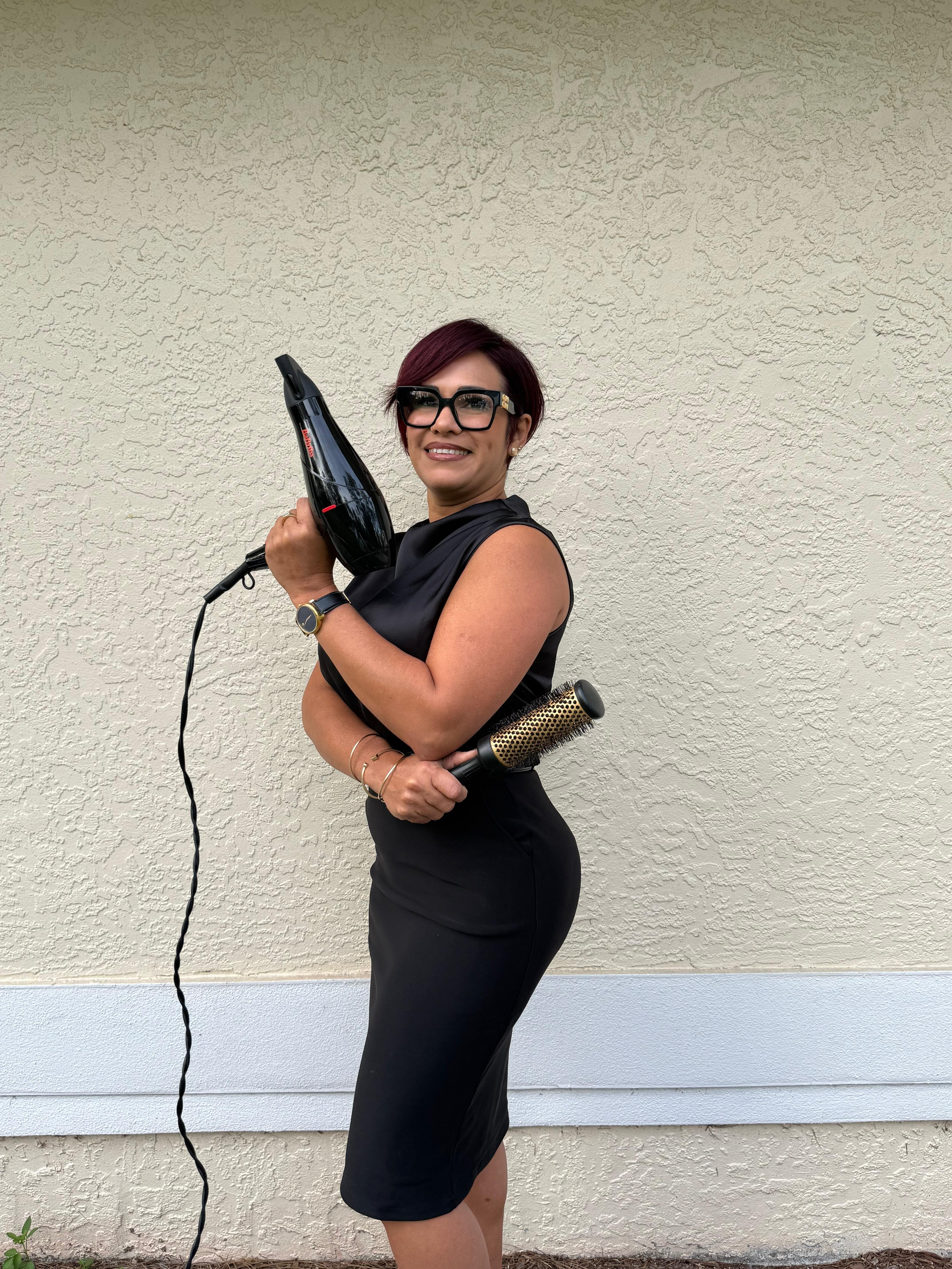 Bouquet Beauty Salon owner with professional styling tools